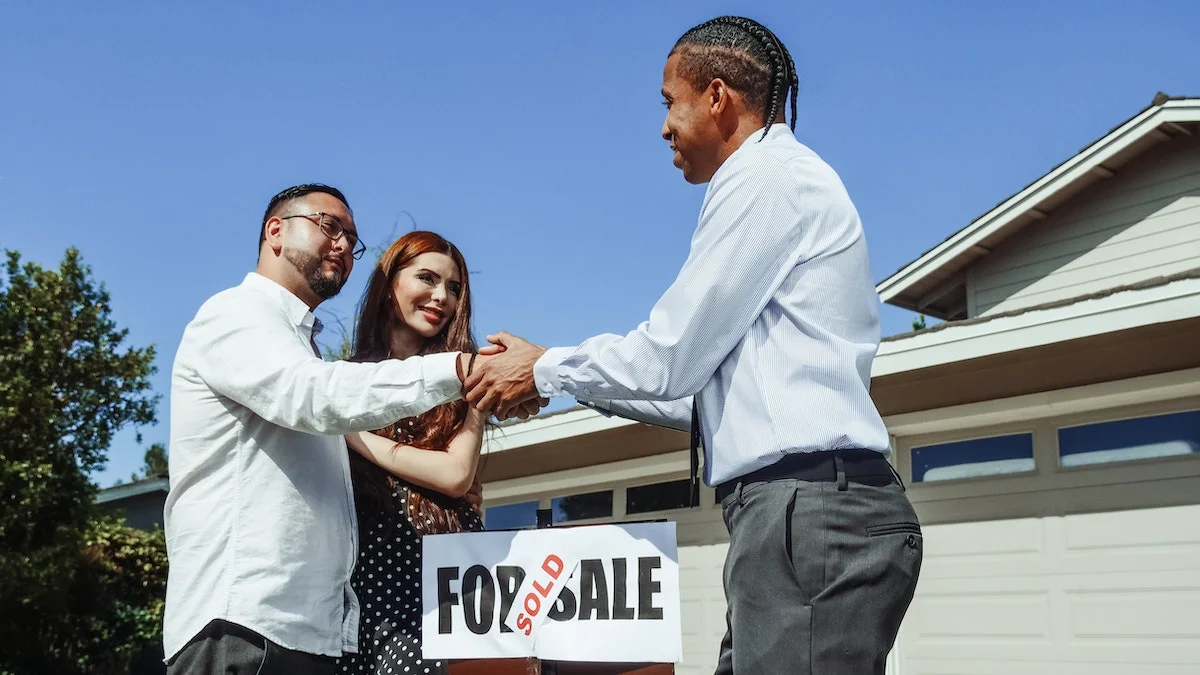 "Real estate agent choosing the benefits of a 100% commission brokerage model.